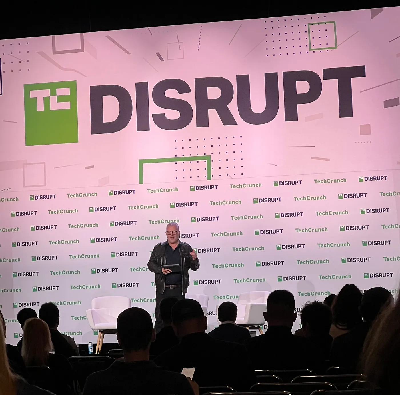 Picture of a man speaking at TechCrunch disrupt.