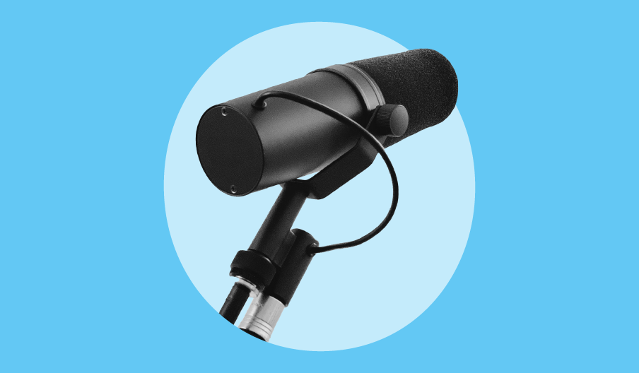 A picture of a microphone against a blue background.